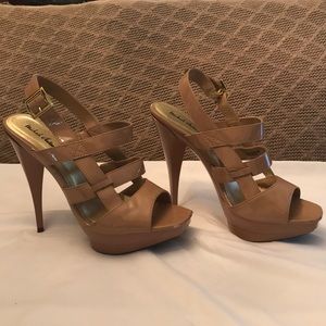 Size 8.5 Beige platform heel sandals.
